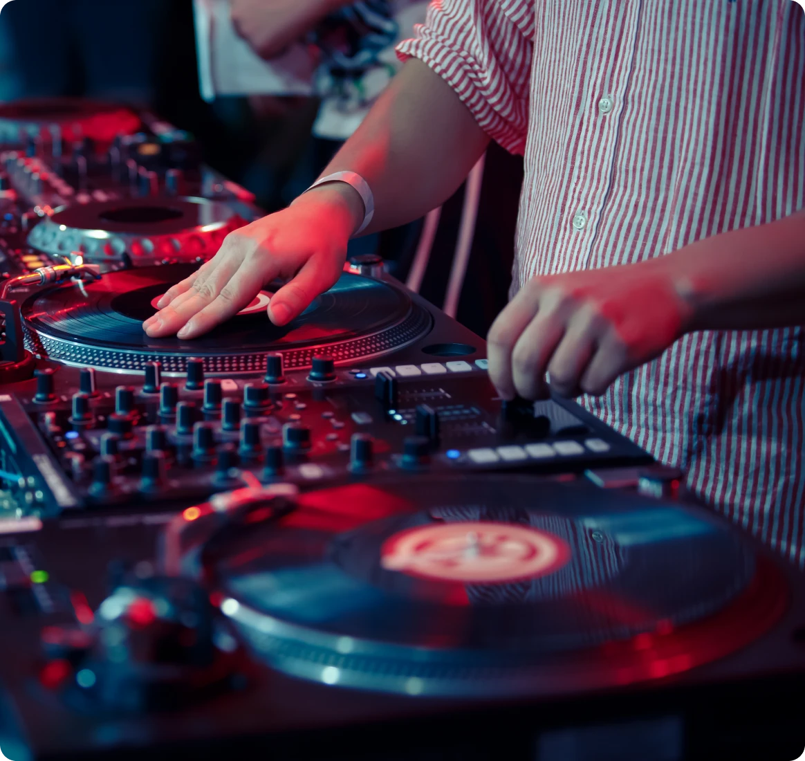 DJ mixing music on turntables